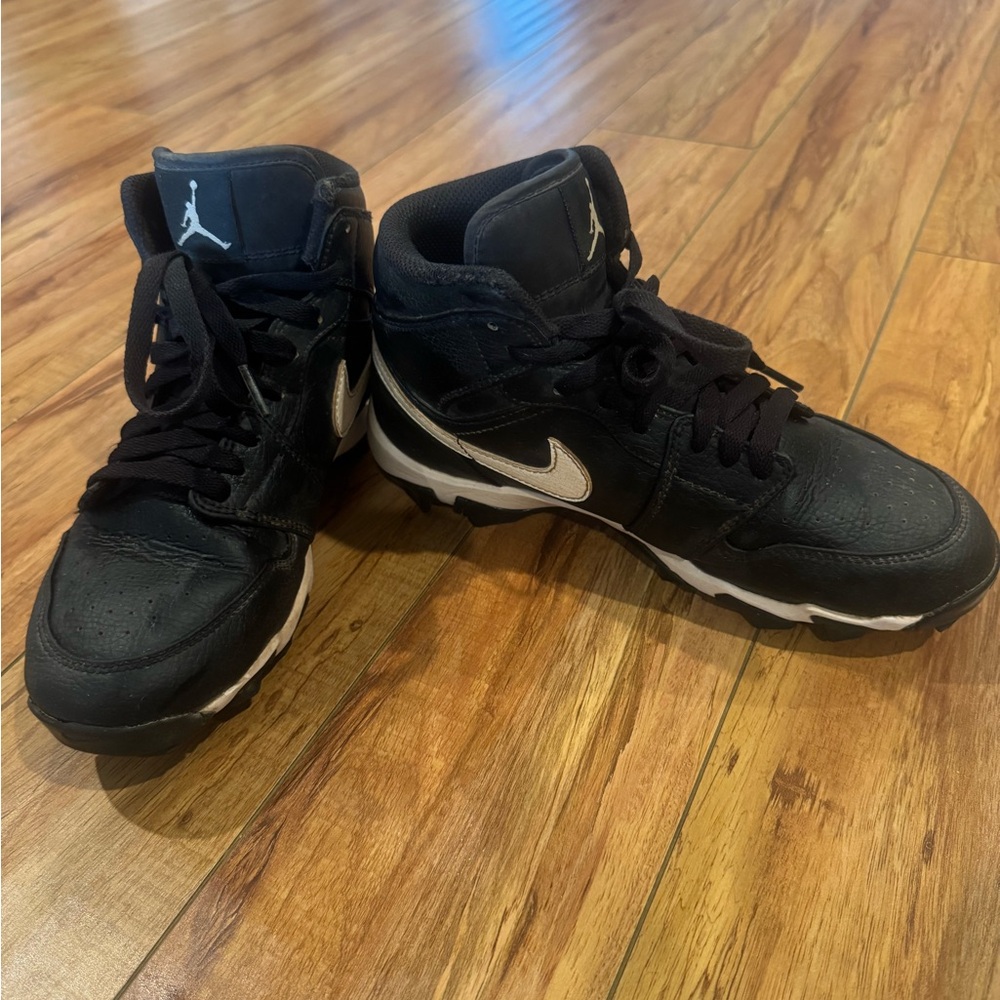 Nike Black and White High-Top cleats